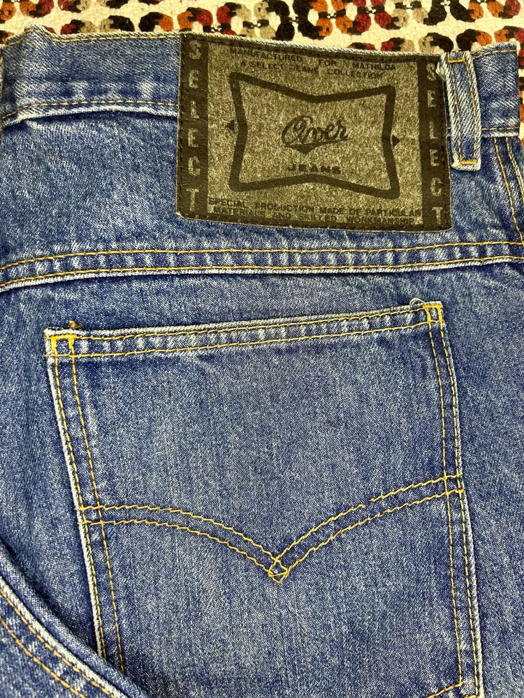 calça Jeans Over Jeans com CGG na Etiqueta