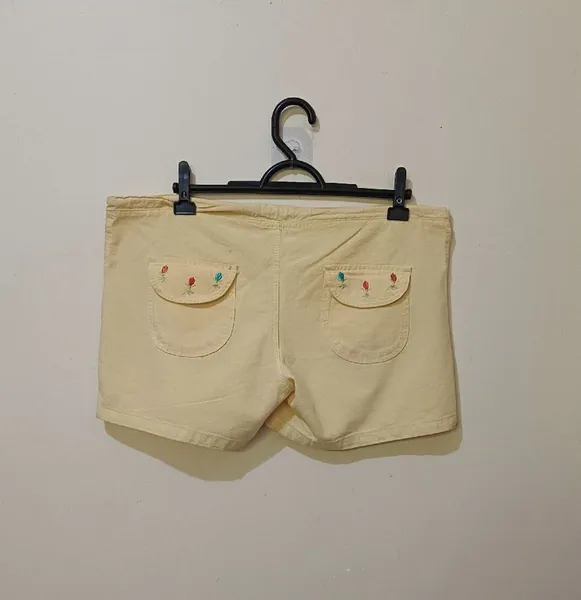 short feminino amarelo