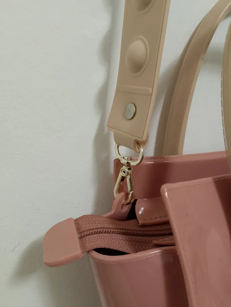 bolsa petite jolie rosa com alça bege