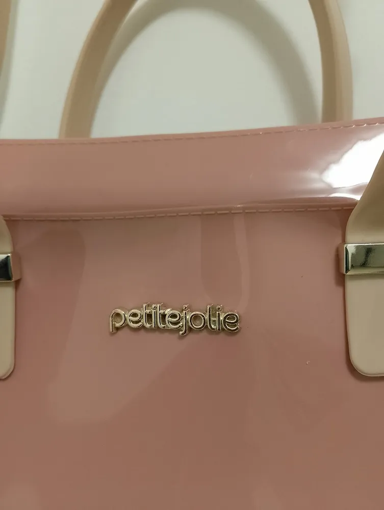 bolsa petite jolie rosa com alça bege