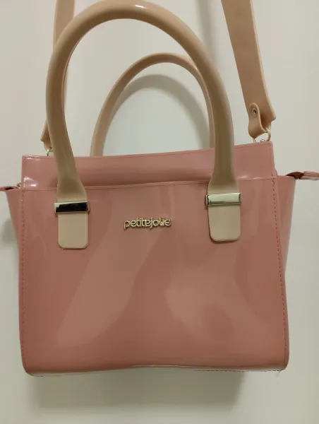bolsa petite jolie rosa com alça bege