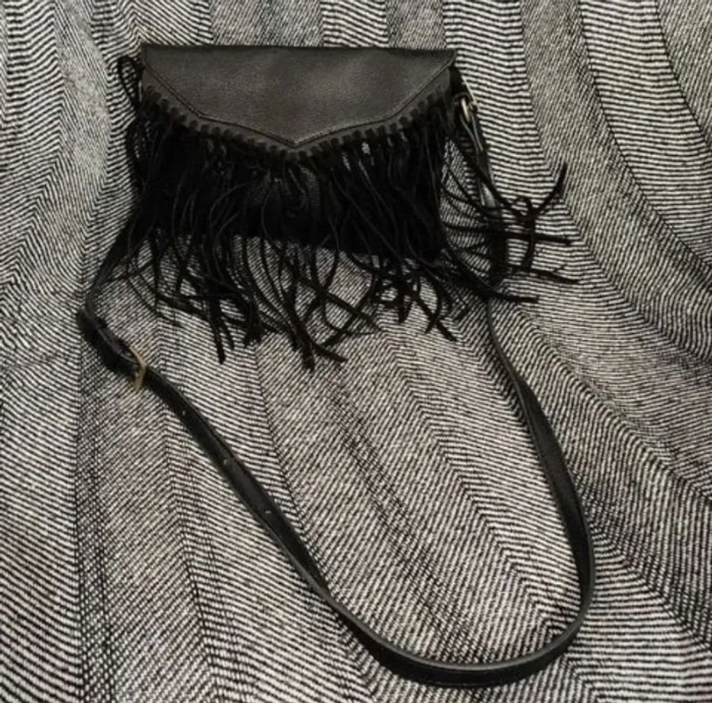 Bolsa Renner preta boho
