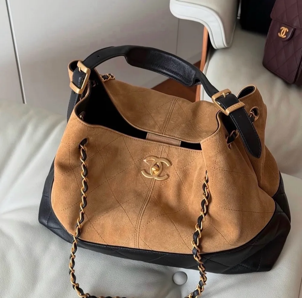 Bolsa chanel gabrielle hobo marrom e preta