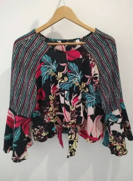 Blusa TVZ feminina manga boca de sino