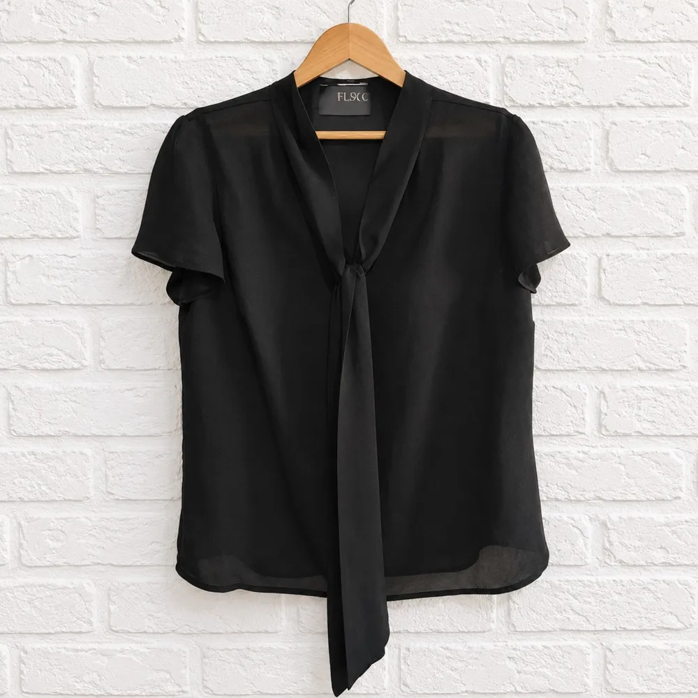 Blusa Pusco com leve transparência