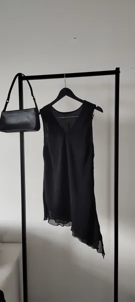 BLUSA ELEGANTE ASSIMÉTRICO