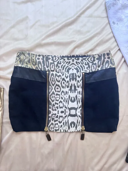 minissaia lanca perfume anos 2000 y2k animal print