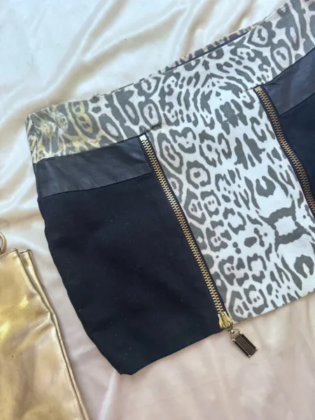 minissaia lanca perfume anos 2000 y2k animal print