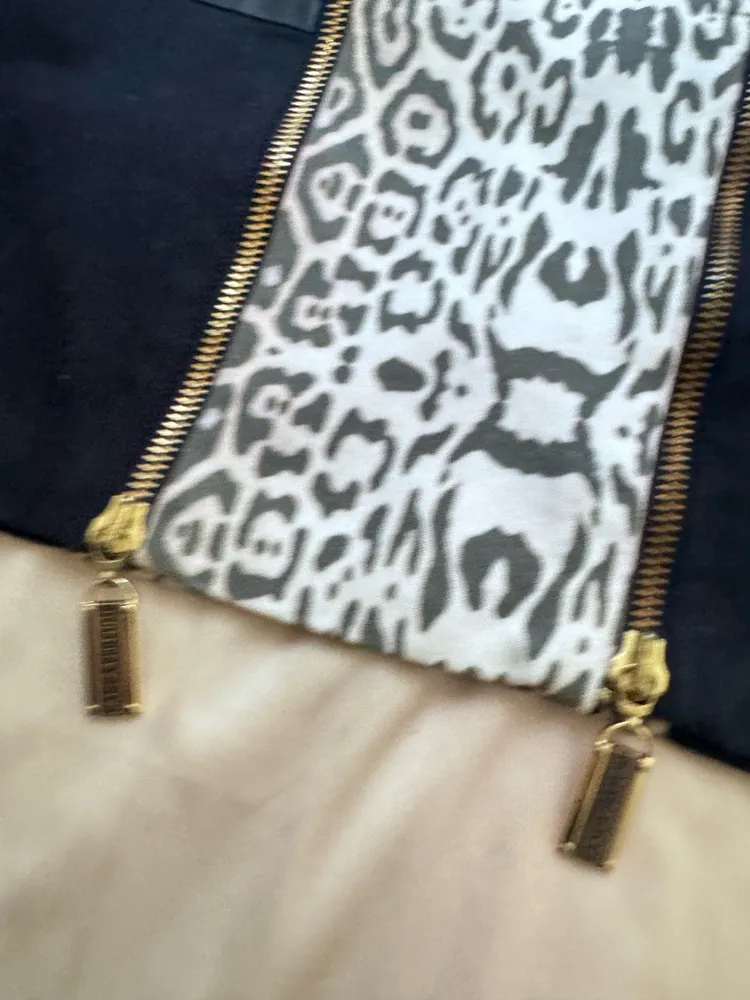 minissaia lanca perfume anos 2000 y2k animal print