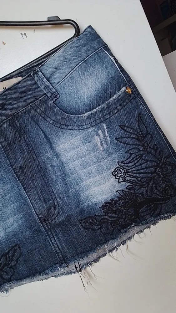 Mini saia jeans Lança Menina