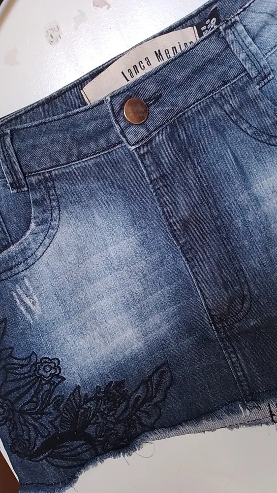 Mini saia jeans Lança Menina