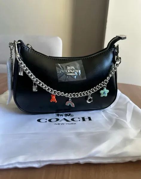 Bolsa Coach teri em couro - Nova