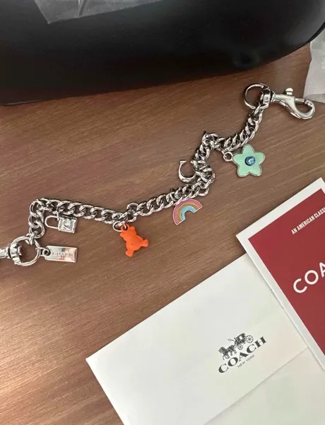 Bolsa Coach teri em couro - Nova