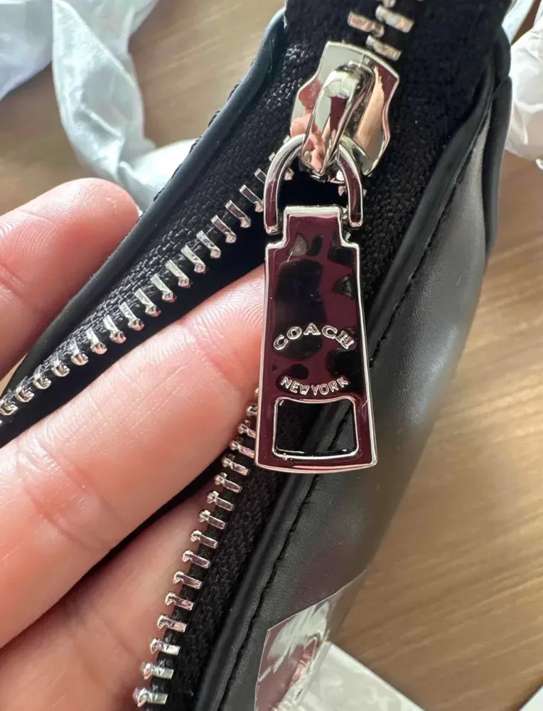 Bolsa Coach teri em couro - Nova