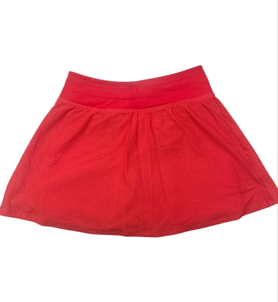 Saia esportiva TRACK & FIELD com short embutido