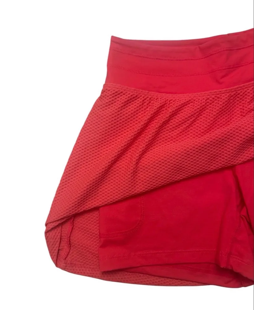 Saia esportiva TRACK & FIELD com short embutido