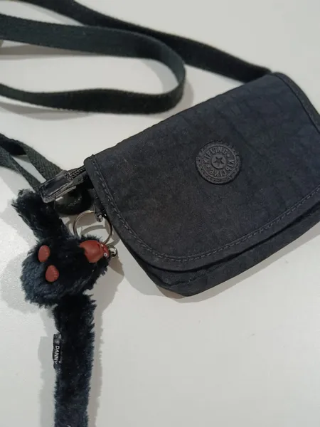 bolsa carteiro kipling