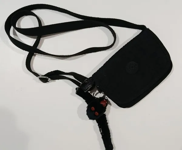 bolsa carteiro kipling