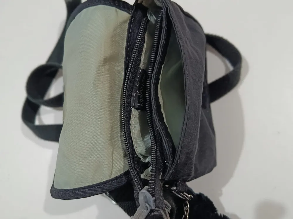 bolsa carteiro kipling