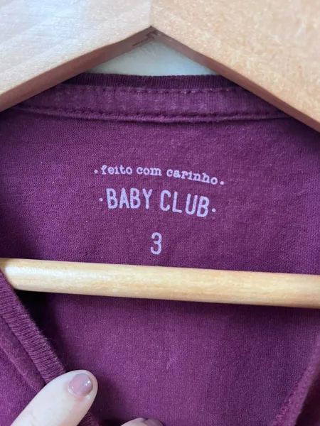 Camisa infantil com manga longa na cor roxa