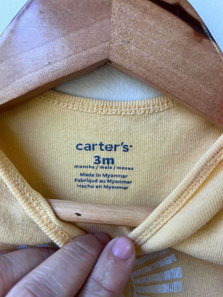 body carters 03 meses amarelo