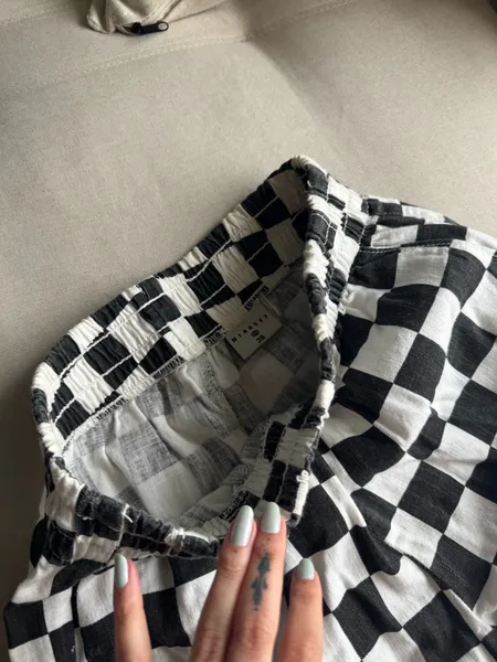 short quadriculado preto e branco