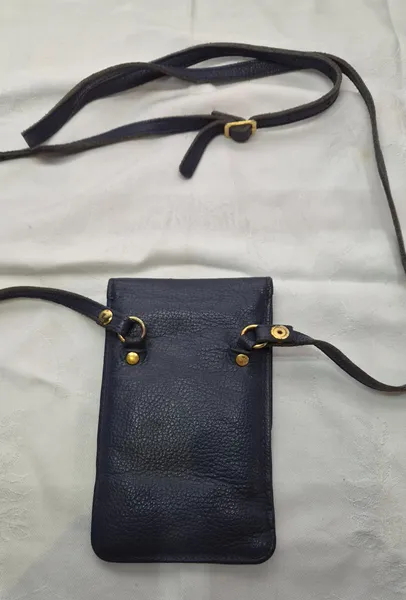 mini bolsa le postiche em couro