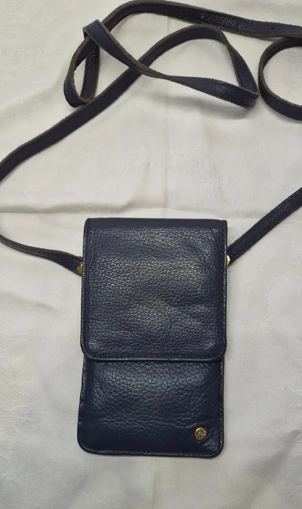 mini bolsa le postiche em couro