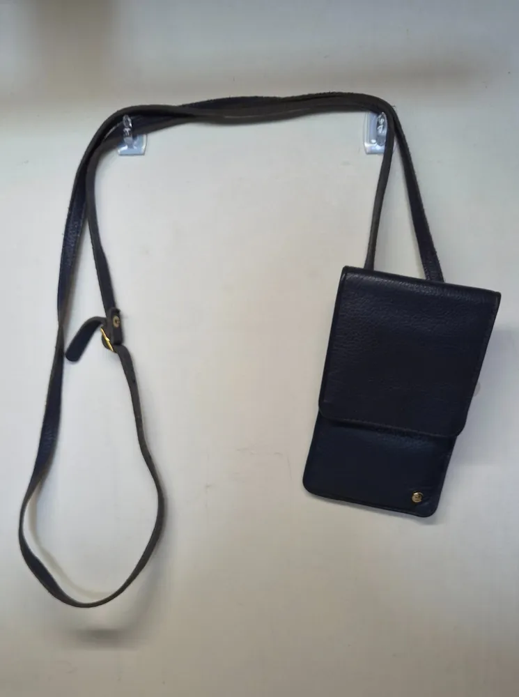 mini bolsa le postiche em couro