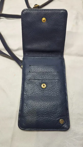 mini bolsa le postiche em couro