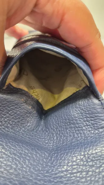 mini bolsa le postiche em couro