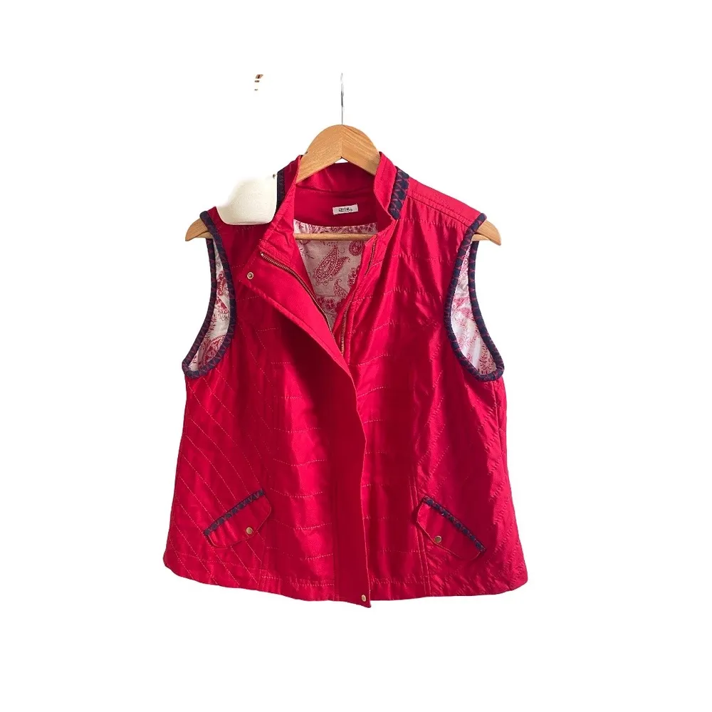 Colete vermelho da Stroke.        G