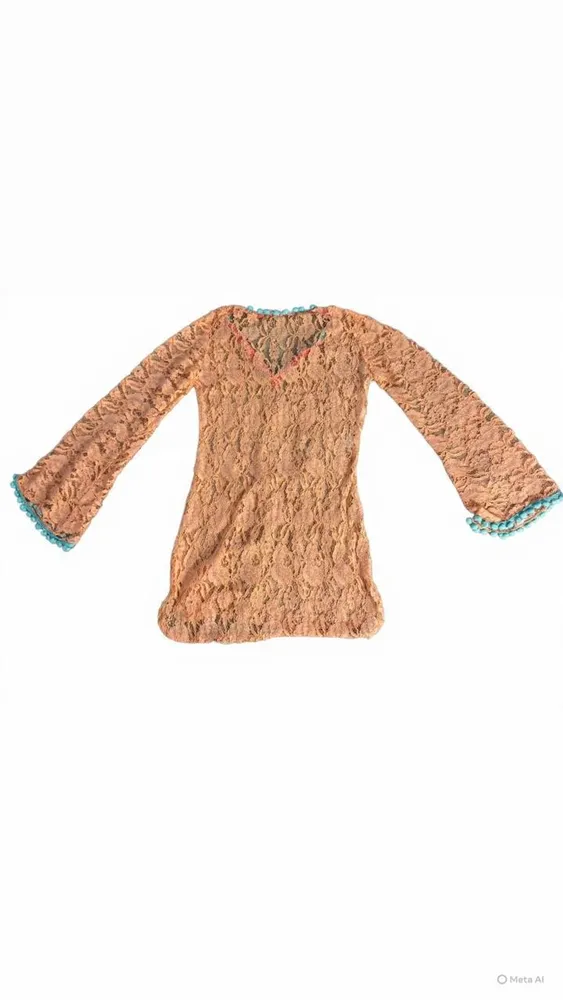 Saída de praia em renda trabalhada estilo Boho e artesanal