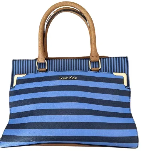 Bolsa azul com listras caramelos