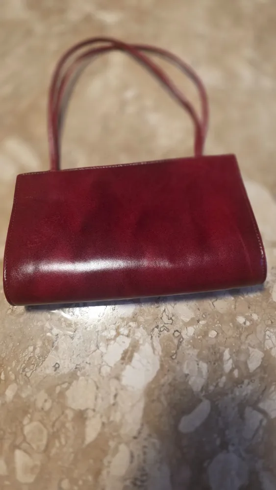 Bolsa de couro bordo vantagens