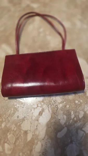 Bolsa de couro bordo vantagens