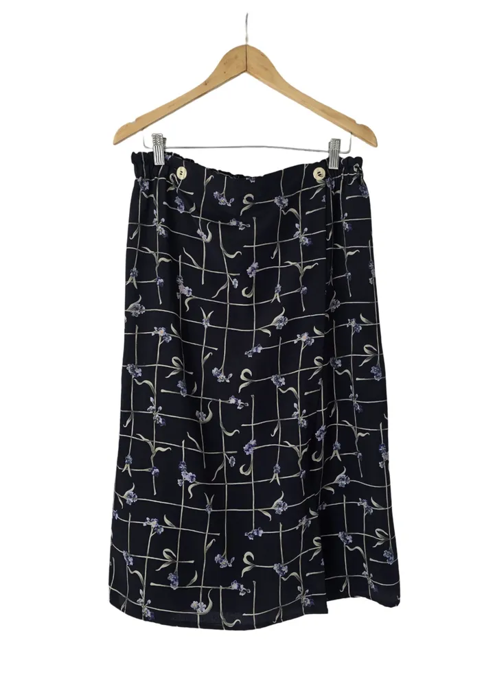 saia midi envelope floral preta