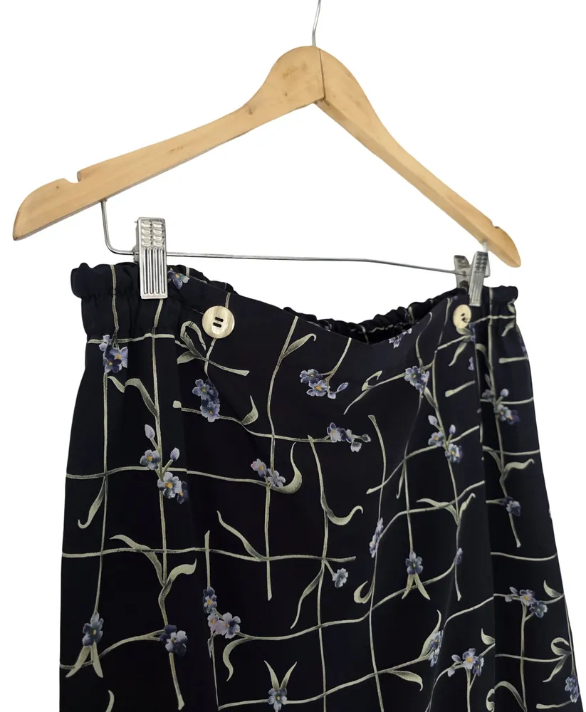 saia midi envelope floral preta