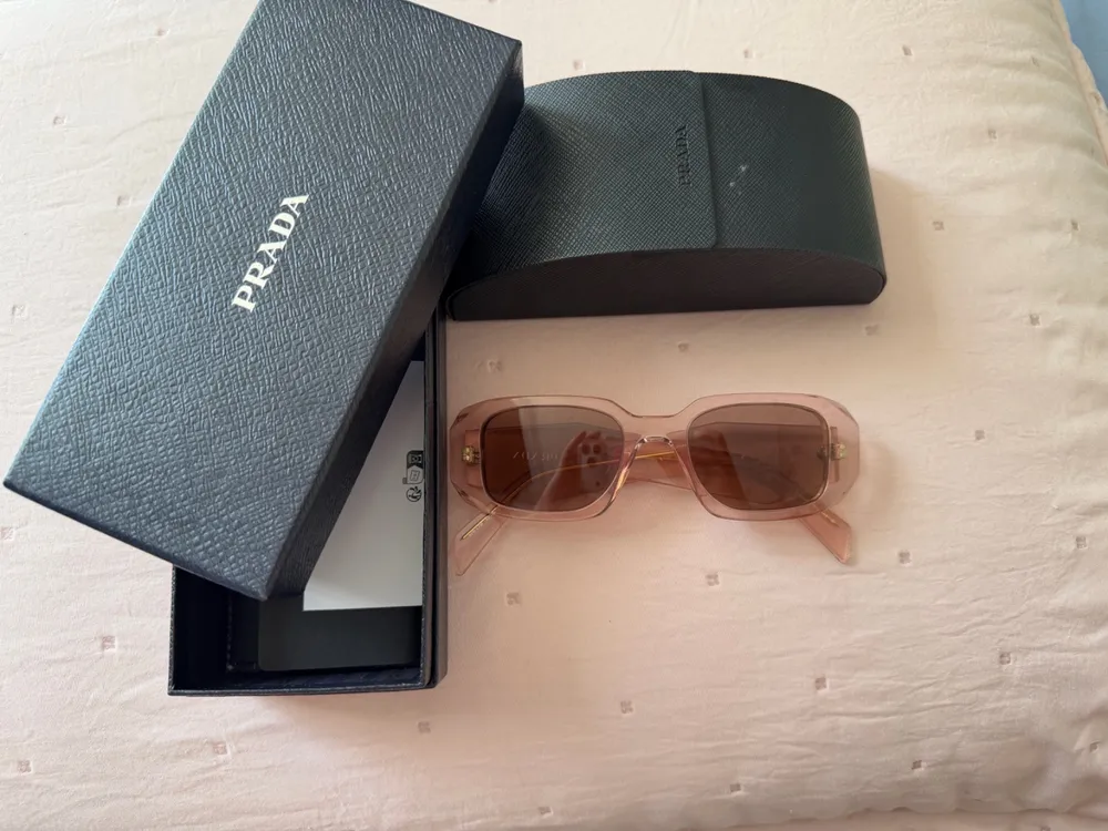 oculos Rosa Prada