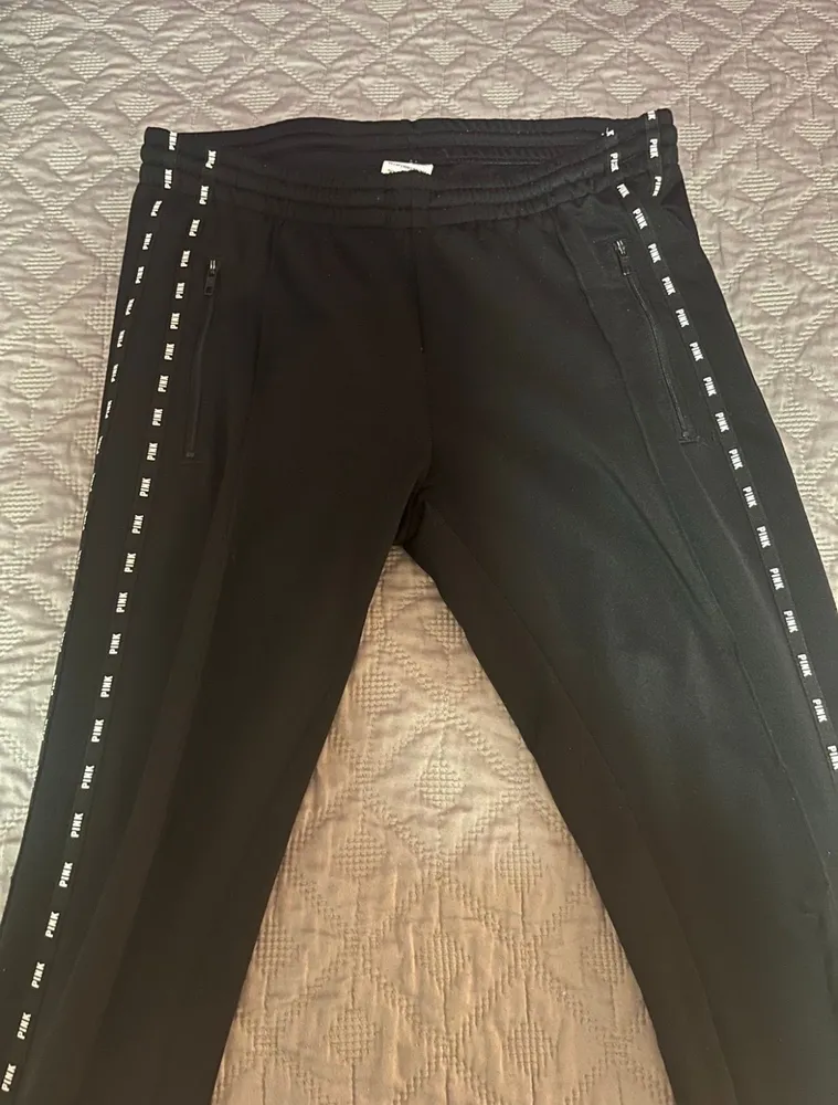 Calça preta pink PP