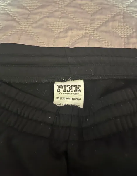 Calça preta pink PP