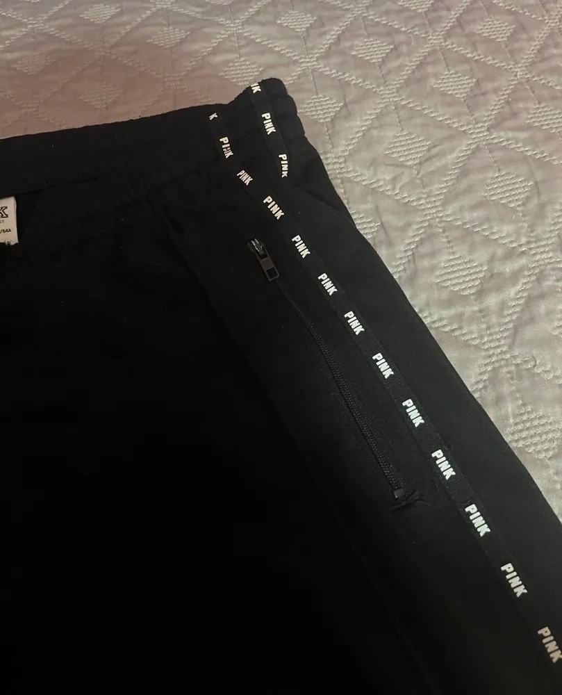 Calça preta pink PP